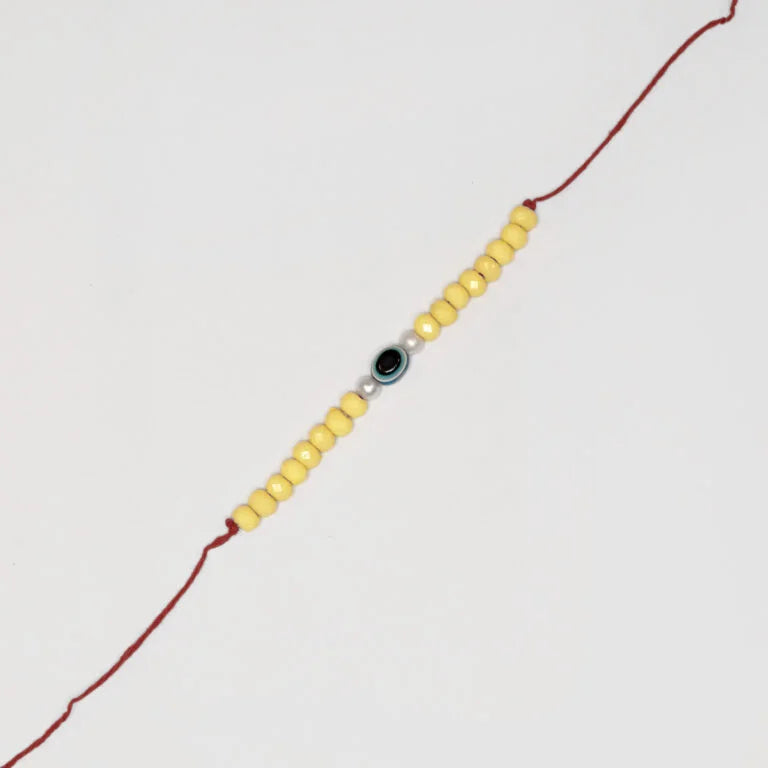 Yellow Evil Eye Rakhi